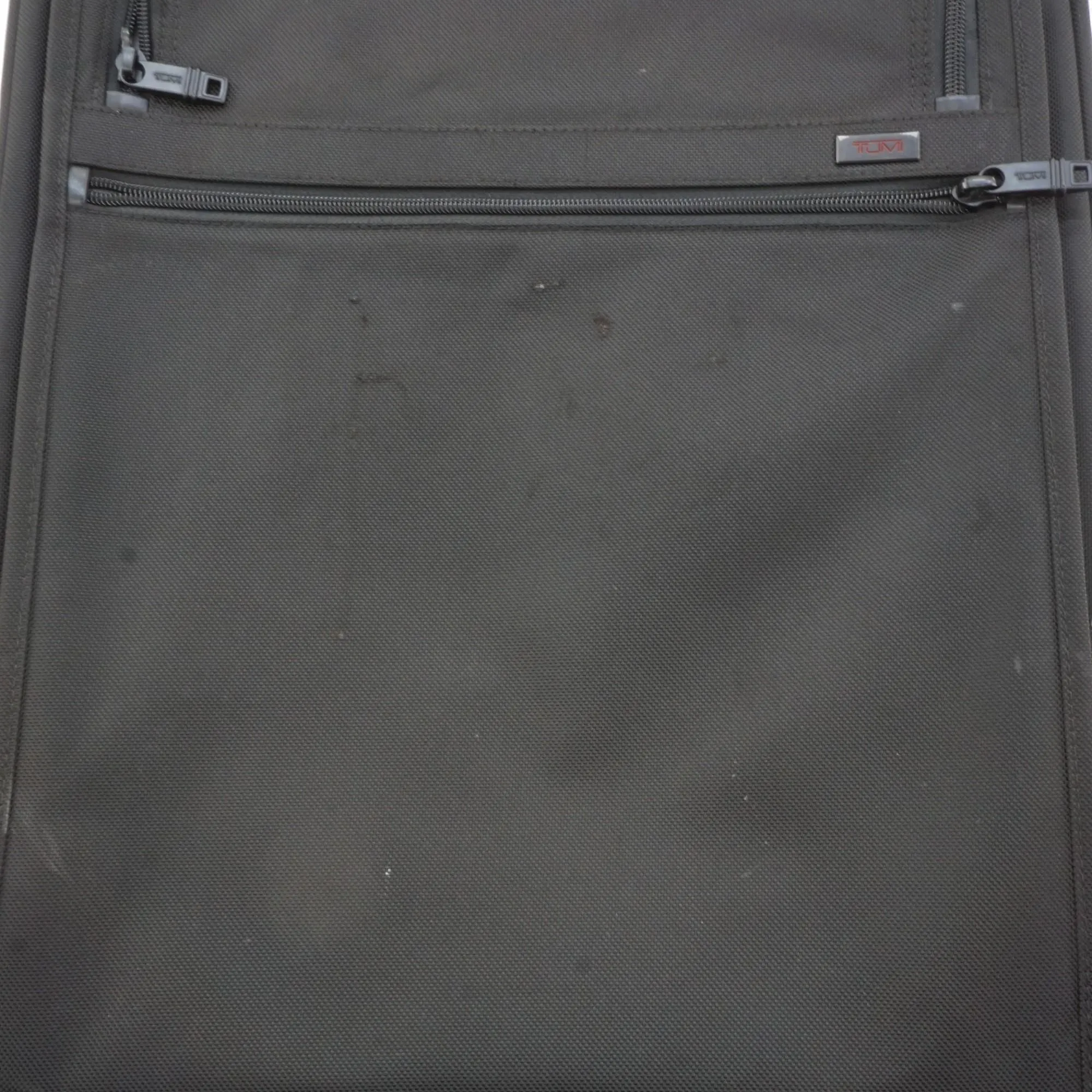 Black Softside International Expandable 4 Wheeled Carry-On